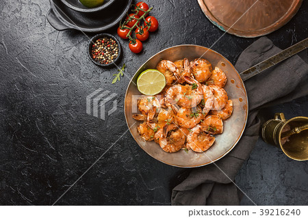 with lemon and thyme in a pan, top 39216240