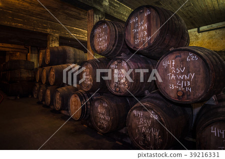 Port wine barrels in cellar, Porto, Portugal Port wine barrels in cellar, Porto, Portugal 39216331