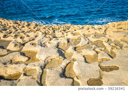 Salt evaporation ponds on Gozo island, Malta 39216341