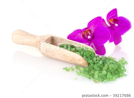 green sea salt in wooden spoon and flower green sea salt in wooden spoon and flower 39217086