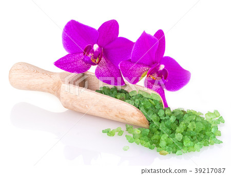 green sea salt in wooden spoon and flower green sea salt in wooden spoon and flower 39217087
