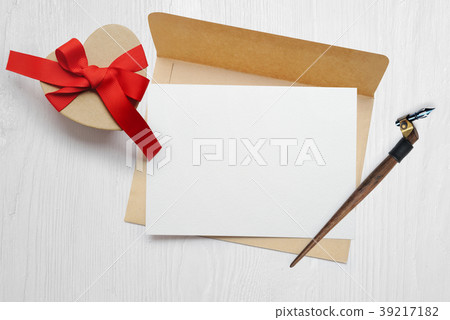 Mockup calligraphic feather an envelope with 39217182