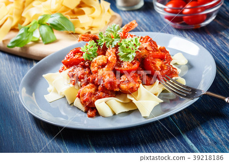 Pappardelle pasta with shrimp, tomatoes and herbs Pappardelle pasta with shrimp, tomatoes and herbs 39218186
