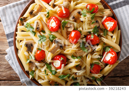 Italian Penne pasta with fried mushrooms, tomato Italian Penne pasta with fried mushrooms, tomato 39218243