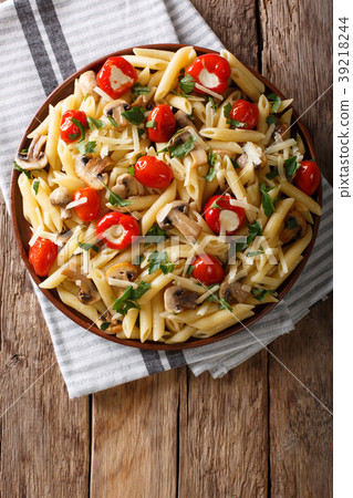 Penne pasta with fried mushrooms, tomato Penne pasta with fried mushrooms, tomato 39218244