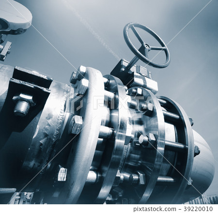 Steel pipelines and valves against blue sky Steel pipelines and valves against blue sky 39220010