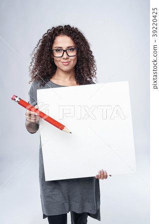Curly woman with whiteboard Curly woman with whiteboard 39220425