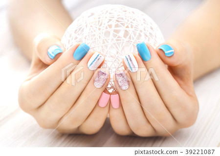 beautiful colored manicure with a white ball of yarn beautiful colored manicure with a white ball of yarn 39221087