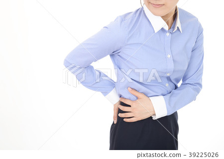 A woman complaining of abdominal pain A woman complaining of abdominal pain 39225026