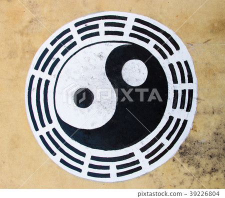 Black and white color yin yang circle on leather 39226804