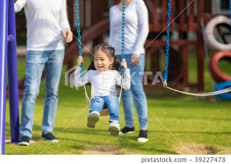 Happy daughter is enjoying to play with parents 39227478