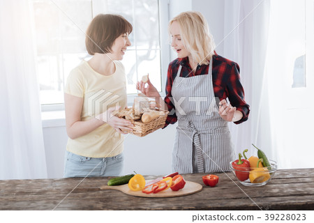 Nice happy woman tasting bread Nice happy woman tasting bread 39228023