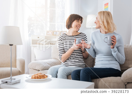 Nice happy women having a conversation 39228173