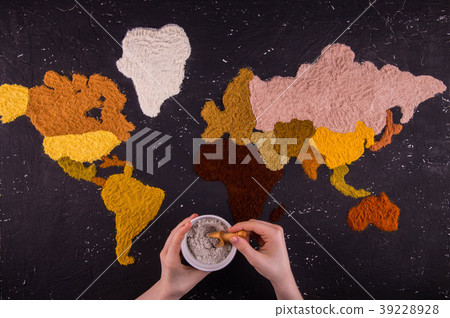 Hands with a jar of spices against the background Hands with a jar of spices against the background 39228928