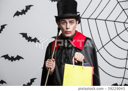 Vampire Halloween Concept - Happy handsome Vampire Halloween Concept - Happy handsome 39229043