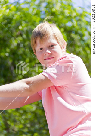 Smiling boy in the stone park Smiling boy in the stone park 39229811