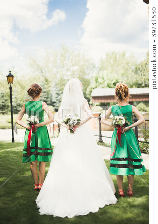 Bride holding big and beautiful wedding bouquet 39231530