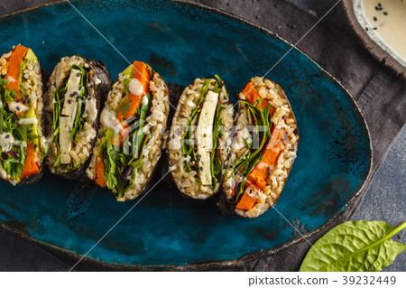 Vegan sushi sandwich onigirazu with tofu  39232449