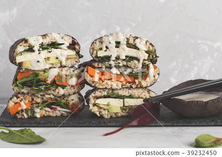 Vegan sushi sandwich onigirazu with tofu  39232450