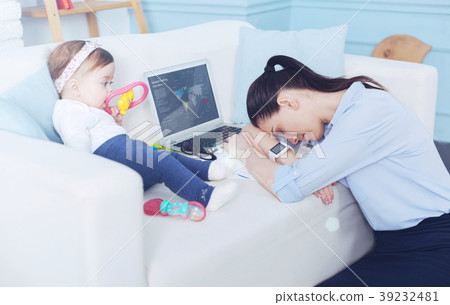 Tired beautiful woman having a nap Tired beautiful woman having a nap 39232481