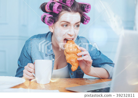 Nice young woman having breakfast 39232811