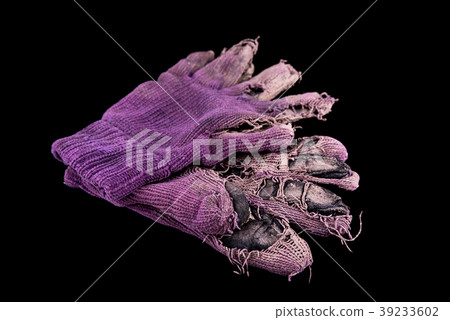 Pair of shabby mittens on black background Pair of shabby mittens on black background 39233602