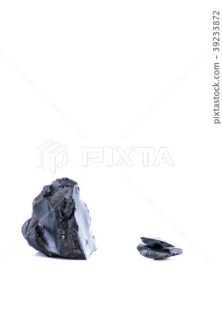 Pieces of black resins isolated on a white Pieces of black resins isolated on a white 39233872