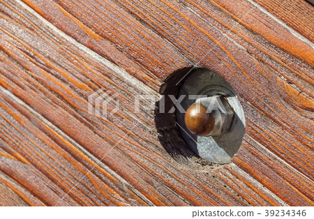 close up of old rusty screw head on rustic wooden close up of old rusty screw head on rustic wooden 39234346