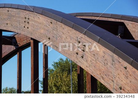 detail of a wooden arch on a bridge detail of a wooden arch on a bridge 39234348