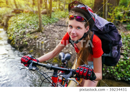 Bicycle woman training . Cyclist with backpack . 39234431