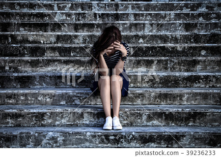 Woman in frustrated depression sitting on stairs, Woman in frustrated depression sitting on stairs, 39236233