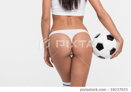 Sexy brunette with a soccer ball Sexy brunette with a soccer ball 39237655