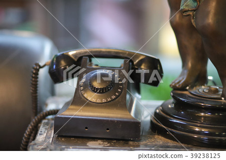 Old black phone livingroom. Old black phone livingroom. 39238125