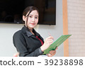 Business woman holding Folder tablet 39238898