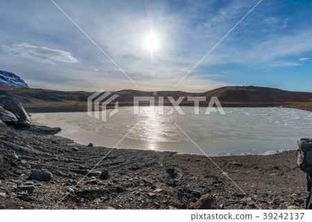 Mountains, valleys and volcano near ice cave Mountains, valleys and volcano near ice cave 39242137