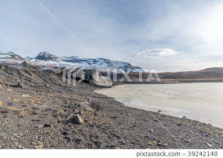 Mountains, valleys and volcano near ice cave 39242140