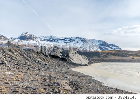 Mountains, valleys and volcano near ice cave 39242143