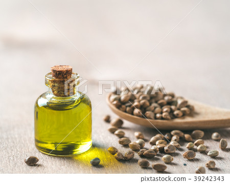 Hemp seeds and hemp oil, copy space 39242343
