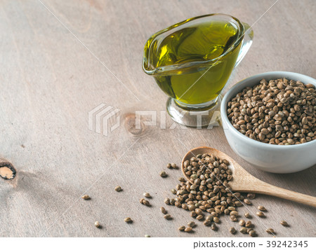 Hemp seeds and hemp oil, copy space 39242345