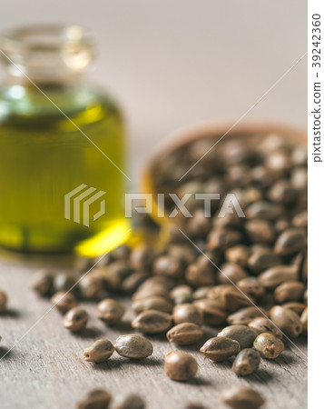 Hemp seeds and hemp oil, copy space 39242360
