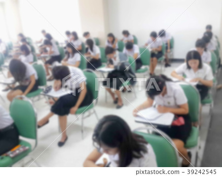 Blur background students were taking an exam in co Blur background students were taking an exam in co 39242545