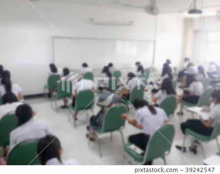 Blur background students were taking an exam in co Blur background students were taking an exam in co 39242547