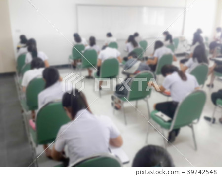 Blur background students were taking an exam in co Blur background students were taking an exam in co 39242548