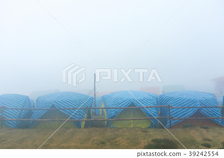 Travel tent in the morning with fog Travel tent in the morning with fog 39242554