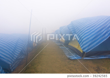 Travel tent in the morning with fog 39242565