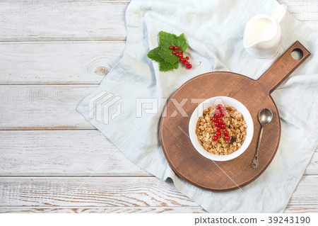 Summer breakfast of granola with red currant. Summer breakfast of granola with red currant. 39243190