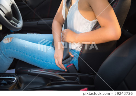 Close-up portrait of driver woman sitting on car 39243726