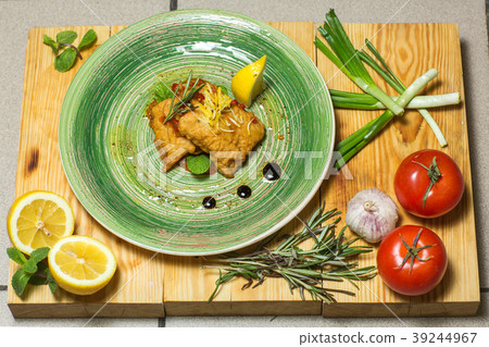 Fish dish - traditional fried cod fish with lemon 39244967