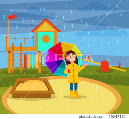 Smiling little girl in yellow raincoat walking 39247161