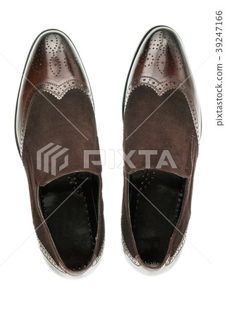 Pair of classic suede brown shoes. 39247166